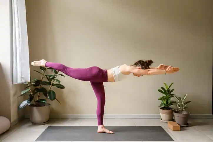 Woman doing Yoga exercise Brentwood to help with toning the body. 