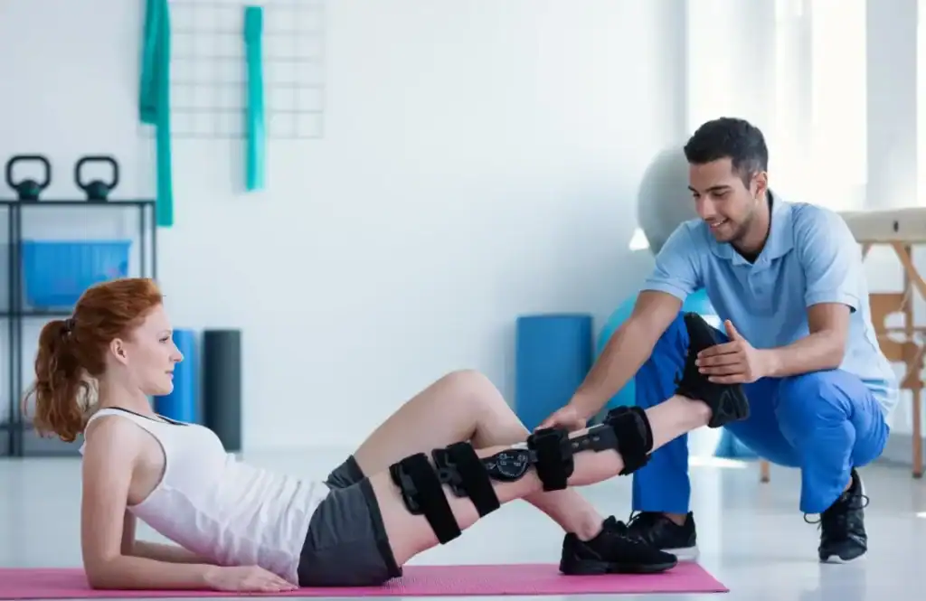 Woman having treatment to help muscle recovery Brentwood after an injury